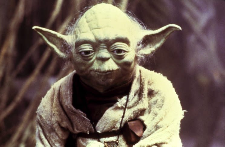 Yoda, seen here in <em>The Empire Strikes Back</em>, has parallels in many religious traditions. (Photo: Everett)