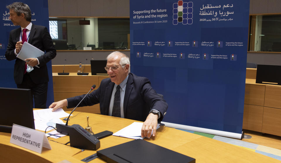 European Union foreign policy chief Josep Borrell begins a meeting, Supporting the future of Syria and the Region, in videoconference format at the European Council building in Brussels, Tuesday, June 30, 2020. (AP Photo/Virginia Mayo, Pool)