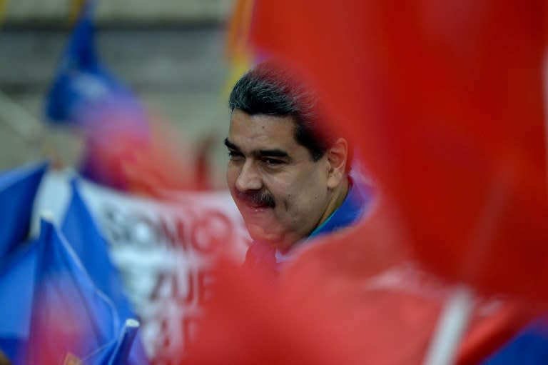 Venezuelan President Nicolas Maduro greets supporters during a rally in Caracas on February 7, 2018