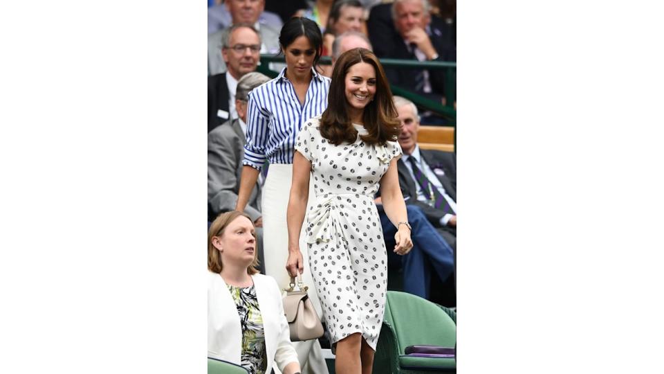 Meghan, Duchess of Sussex and Catherine, Duchess of Cambridge attend day twelve of the Wimbledon Lawn Tennis Championships