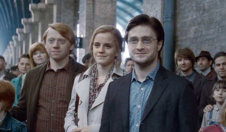 Rupert Grint, Emma Watson and Daniel Radcliffe as adult Ron, Hermione and Harry at the end of The Deathly Hallows. (Warner Bros)