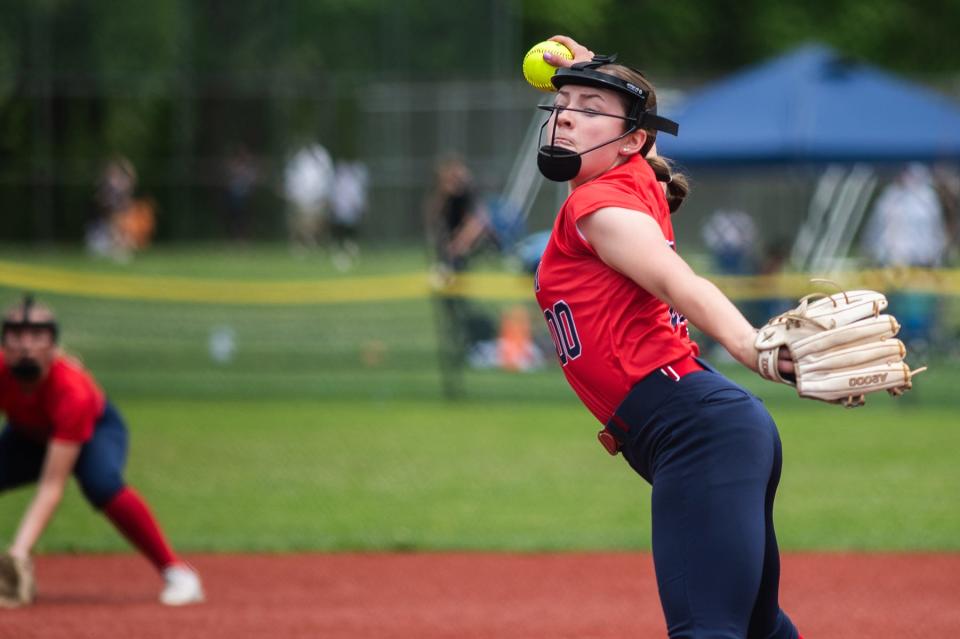 Ketcham's Kaelyn Brenner delivers a pitch during a Section 1 Class AAA softball quarterfinal against Arlington on May 18, 2024.