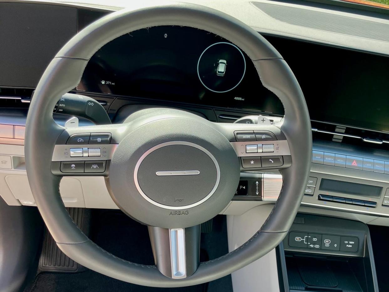 The steering wheel of the 2024 Hyundai Kona Limited AWD