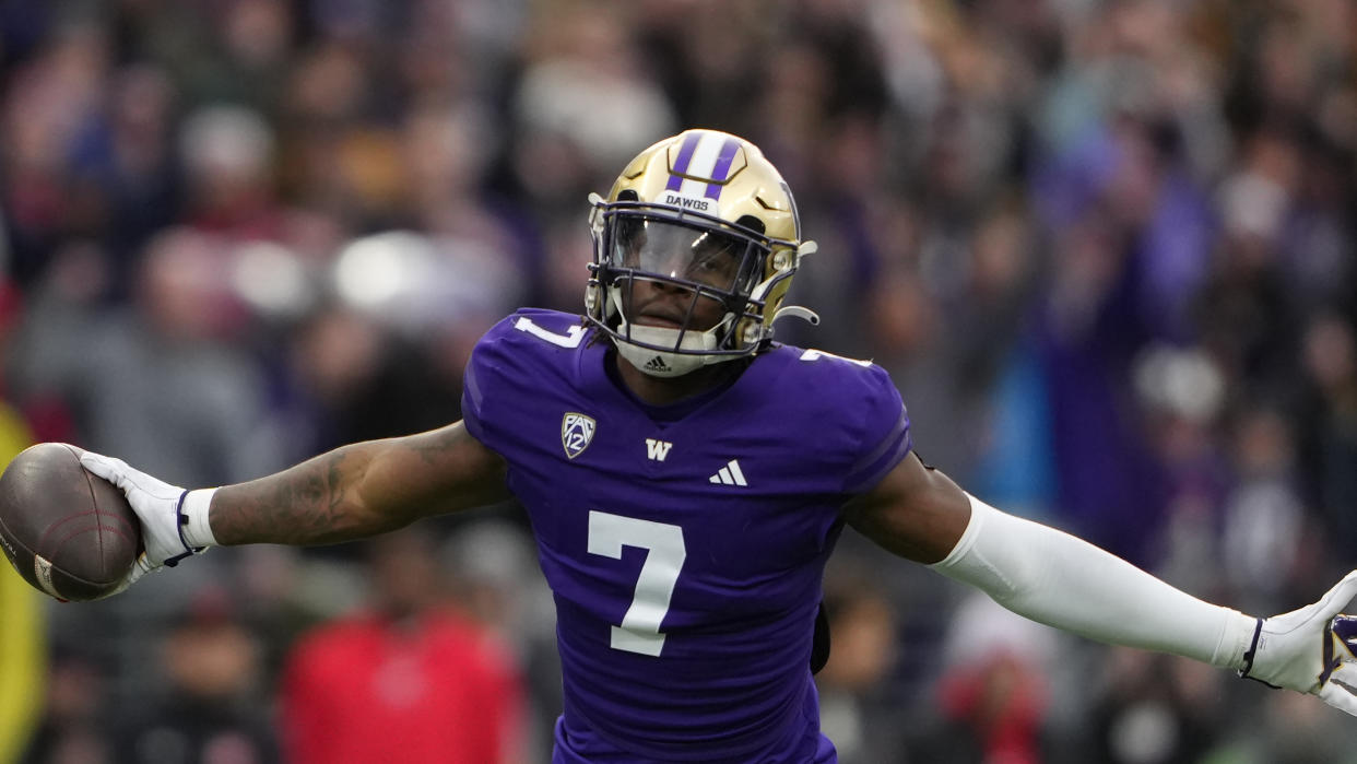 Washington cornerback Dominique Hampton (7) reacts after making an interception against Utah during the second half of an NCAA college football game Saturday, Nov. 11, 2023, in Seattle. Washington won 35-28. (AP Photo/Lindsey Wasson)