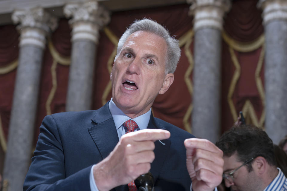 Speaker of the House Kevin McCarthy, R-Calif., expresses his frustration with Democrats and President Joe Biden over the debt limit negotiations as he speaks to reporters in Statuary Hall at the Capitol in Washington, Wednesday, May 24, 2023. (AP Photo/J. Scott Applewhite)