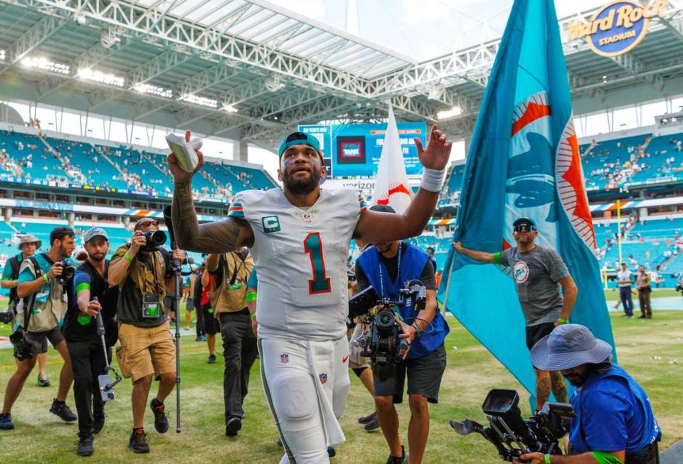 Miami Dolphins quarterback Tua Tagovailoa (1) walk off the field after the Dolphins 31-17 win over the New England Patriots during an NFL football game at Hard Rock Stadium on Sunday, Oct. 29, 2023 in Miami Gardens, Fl.