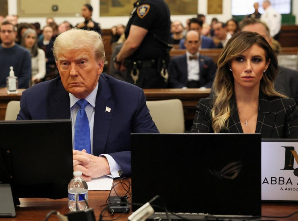 PHOTO: Former President Donald Trump and lawyer Alina Habba attend the Trump Organization civil fraud trial, in New York State Supreme Court in New York City, Nov 6, 2023.  (Brendan McDermid/Reuters)