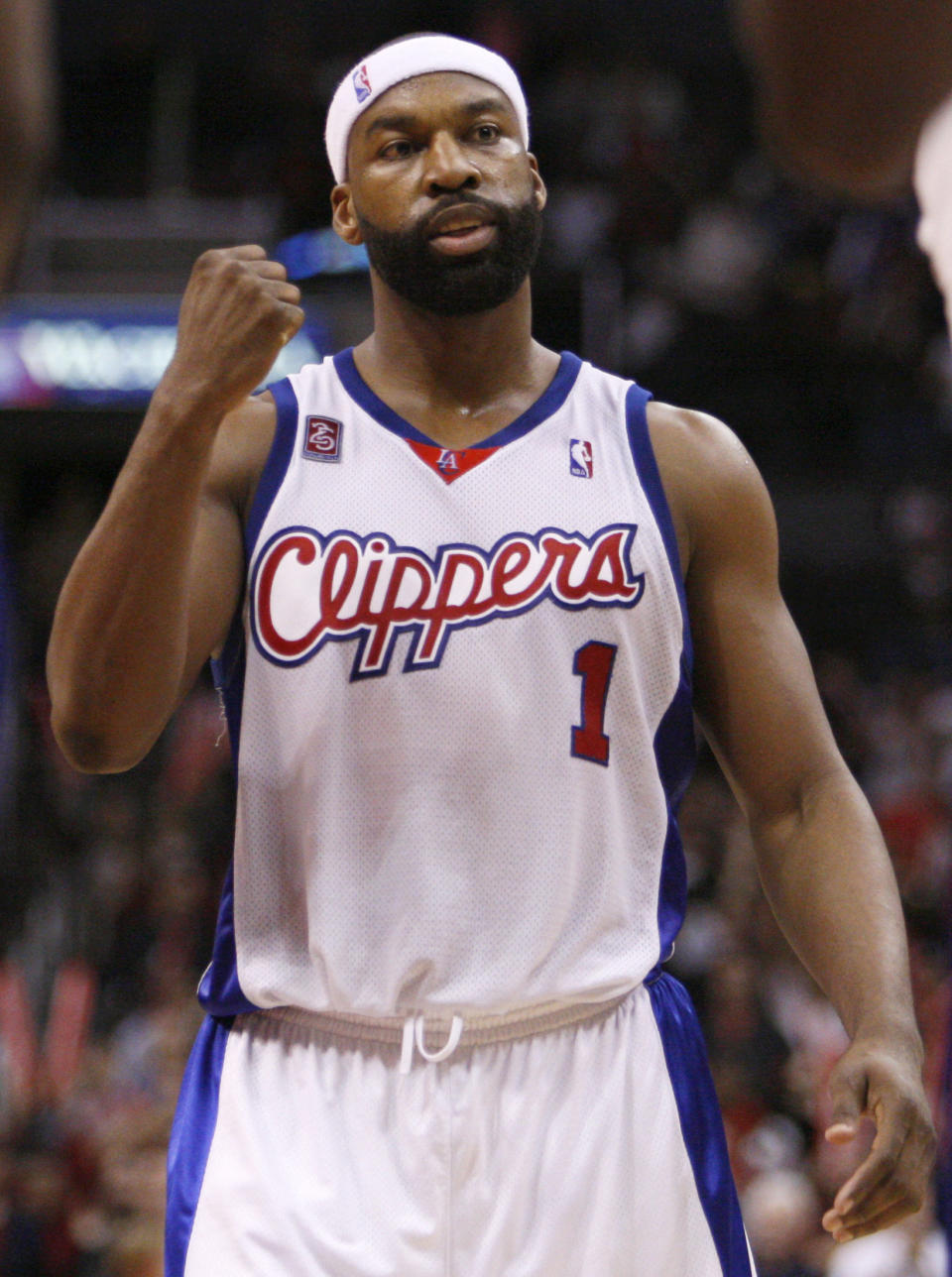 Baron Davis makes a celebratory fist during a Clippers game.