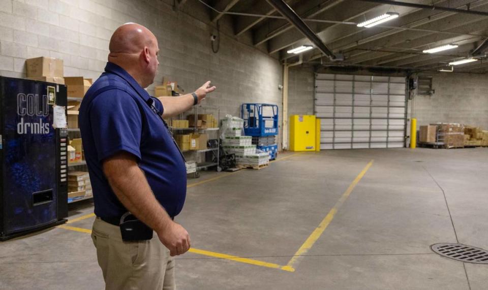 Ada County Sheriff’s Office Lt. Shem McCulloch points out that their Inmate intake area is also being used for storage at the Ada County Jail, Oct. 17, 2023. A $49 million bond to expand and upgrade the jail’s infrastructure failed in November.