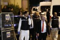 Turkish police officers arrive at the Saudi Arabia's Consulate in Istanbul, Monday, Oct. 15, 2018. Turkish crime scene investigators dressed in coveralls and gloves entered the consulate Monday, nearly two weeks after the disappearance and alleged slaying of Saudi writer Jamal Khashoggi there. (AP Photo/Emrah Gurel)