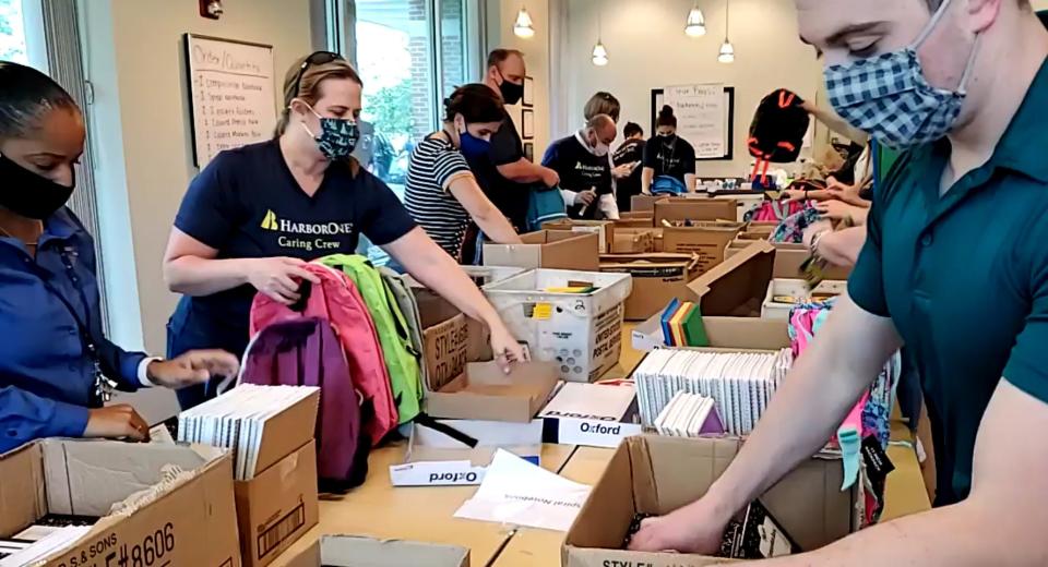 Employees of HarborOne Bank assembled more than 1,000 backpacks for several community nonprofits, including Interfaith Social Services of Quincy.