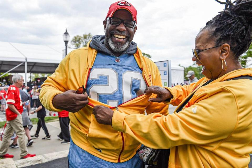 Shyree Leverett exposes the Detroit Lions jersey her husband Tony Leverett was wearing to reveal that he is secretly a Lions fan at the NFL Draft Experience Thursday, April 27, 2023, at the National WWI Museum and Memorial in Kansas City.