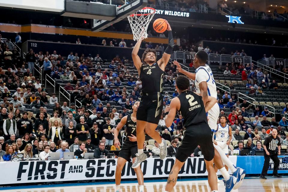 Oakland Golden Grizzlies forward Trey Townsend (4) shoots the ball against the Kentucky Wildcats in the first round of the 2024 NCAA Tournament at PPG Paints Arena in Pittsburgh, Pennsylvania on Thursday, March 21, 2024.