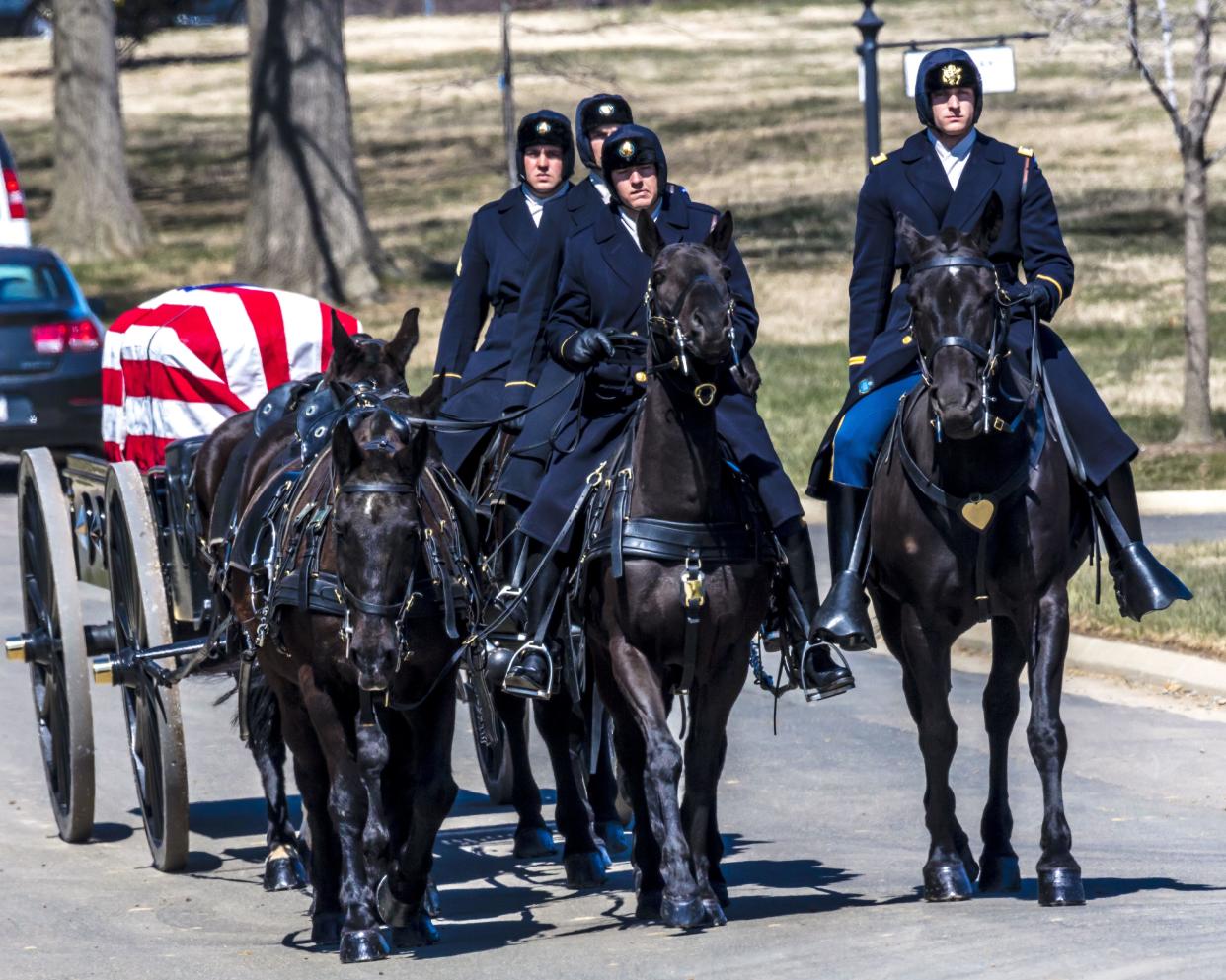 FILE: Burial at Arlington National Cemetery, Virginia, with coffin carried on horse drawn caisson. / Credit: Visions of America/Universal Images Group via Getty Images