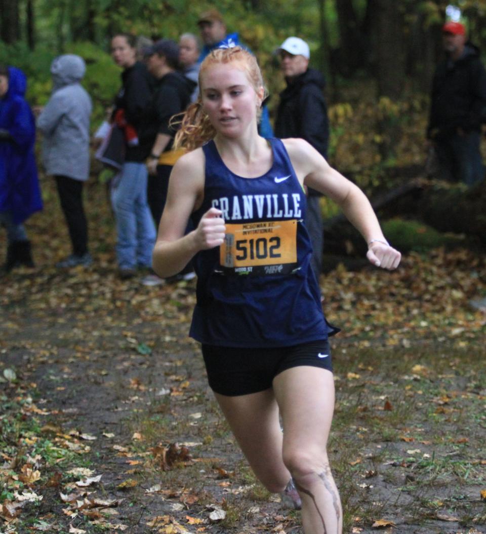 Granville's Kara Bergeron leads the pack through the first mile of the Licking County League championships last October. Bergeron was a key to four consecutive state runs for the Blue Aces, including the 2022 Division II title team, and has signed to run at the University of Tampa.