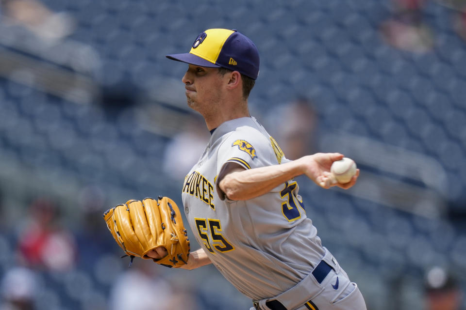 Milwaukee Brewers relief pitcher Hoby Milner throws during the fifth inning of a baseball game against the Washington Nationals at Nationals Park, Wednesday, Aug. 2, 2023, in Washington. (AP Photo/Alex Brandon)