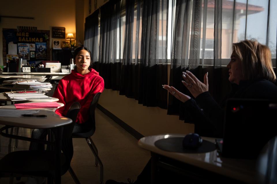 AVID early college facilitator Lesley Salinas goes over program tutorials for freshman Leilah Munoz during a voluntary half-day at H.M. King Early College High School on Friday, Feb. 9, 2024, in Kingsville, Texas.