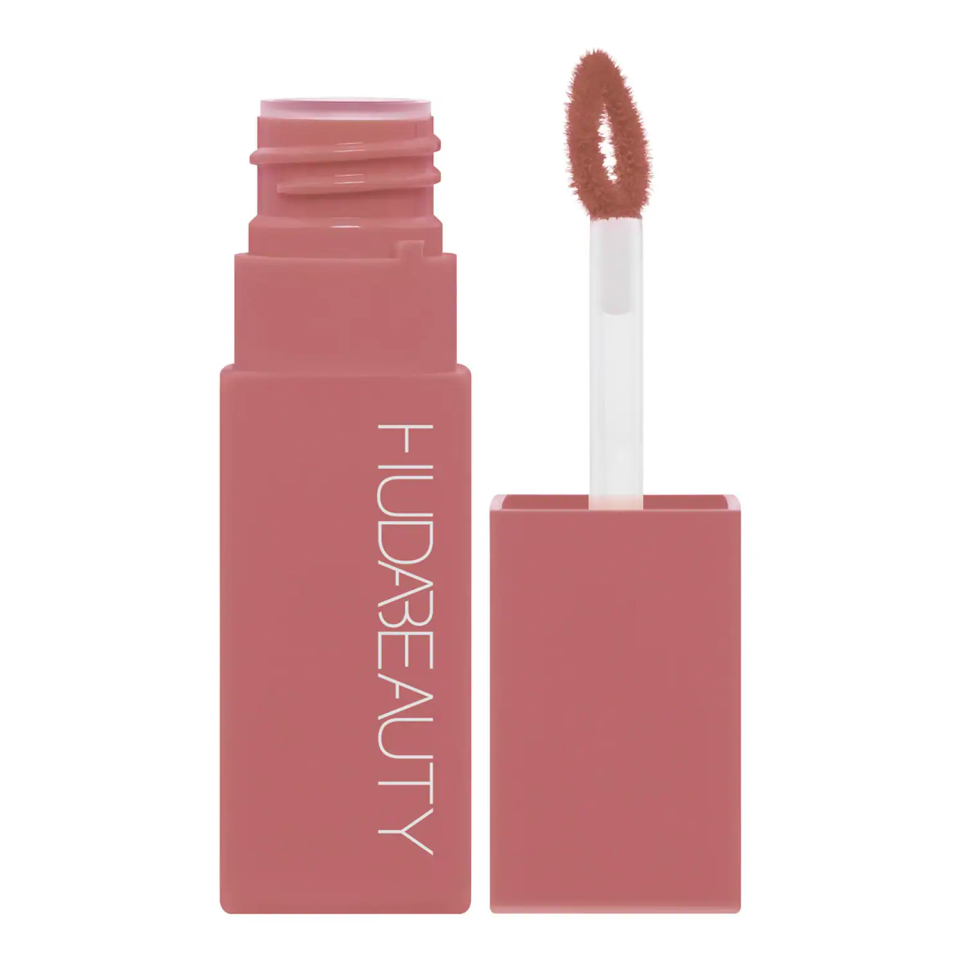 <p><a href="https://go.redirectingat.com?id=74968X1596630&url=https%3A%2F%2Fwww.sephora.com%2Fproduct%2Fhuda-beauty-lip-blush-creamy-natural-matte-lip-cheek-stain-P506181&sref=https%3A%2F%2Fwww.elle.com%2Fbeauty%2Fg44578002%2Fbest-liquid-blush%2F" rel="nofollow noopener" target="_blank" data-ylk="slk:Shop Now;elm:context_link;itc:0;sec:content-canvas" class="link ">Shop Now</a></p><p>Lip Blush Cream Lip & Cheek Stain Berry Kiss </p><p>sephora.com</p><p>$25.00</p>