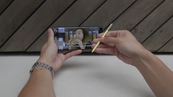 Use the S Pen to control YouTube video playback.