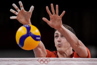 during the men's volleyball semifinal match between Brazil and Russian Olympic Committee at the 2020 Summer Olympics, Thursday, Aug. 5, 2021, in Tokyo, Japan. (AP Photo/Manu Fernandez)