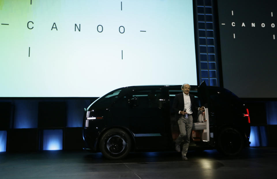 Ulrich Kranz, co-Founder & CEO of Canoo, arrives in his first electric van model at AutoMobility LA auto show in Los Angeles, Tuesday, Nov. 19, 2019. (AP Photo/Damian Dovarganes)