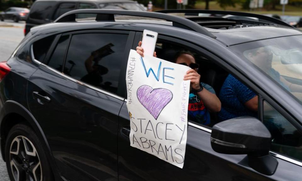 A supporter thanks Stacey Abrams after Joe Biden was named the projected presidential winner.