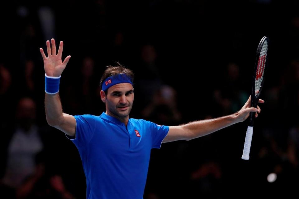 Marching on: Federer booked booked his place in the last four with victory over Anderson (Action Images via Reuters)