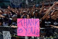 LOS ANGELES, CA - JUNE 14: Fans cheer for the Los Angeles Kings team menbers during the Stanley Cup victory parade on June 14, 2012 in Los Angeles, California. The Kings are celebrating their first NHL Championship in the team's 45-year-old franchise history. (Photo by Kevork Djansezian/Getty Images)