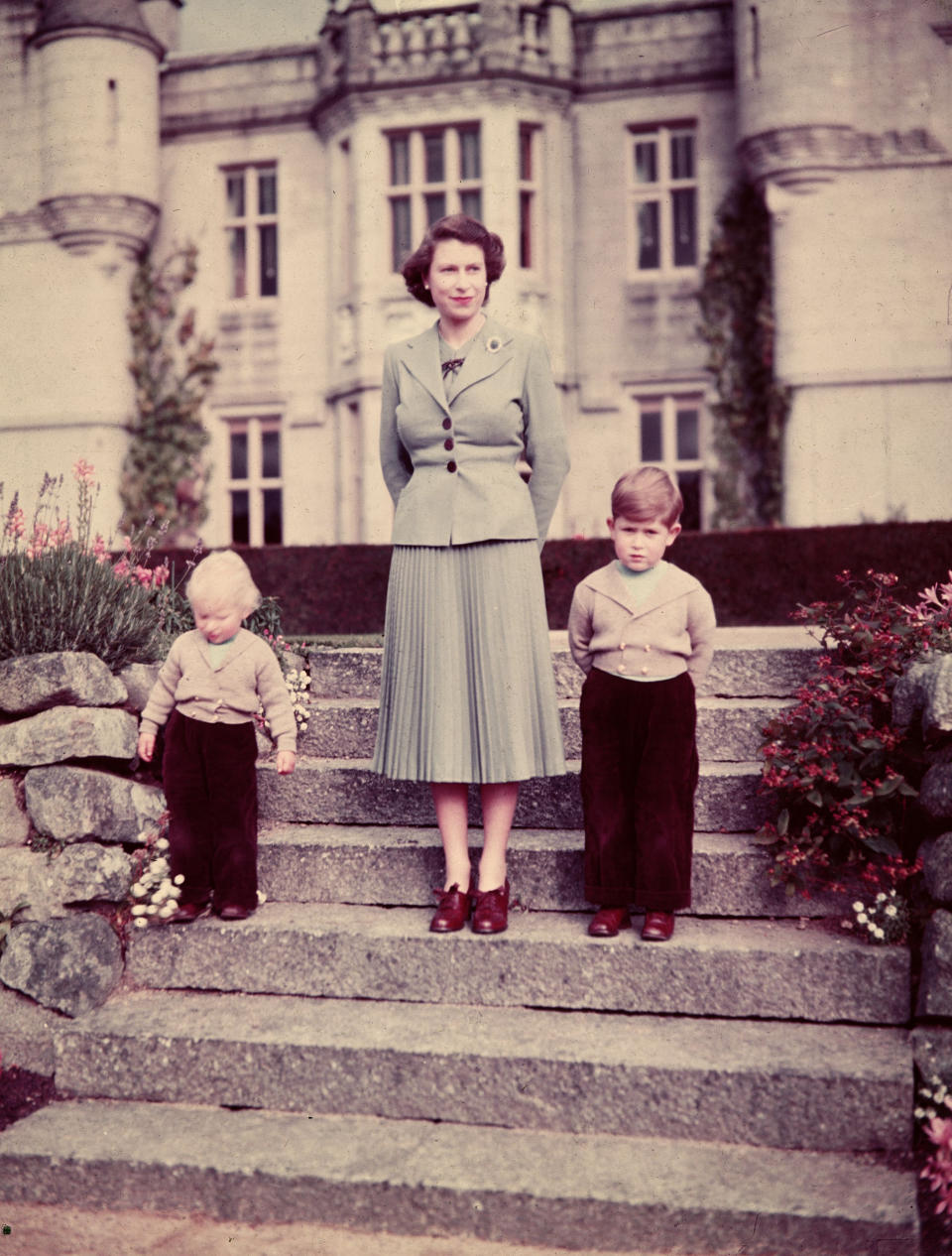 Queen Elizabeth with young Prince Charles and Princess Anne 