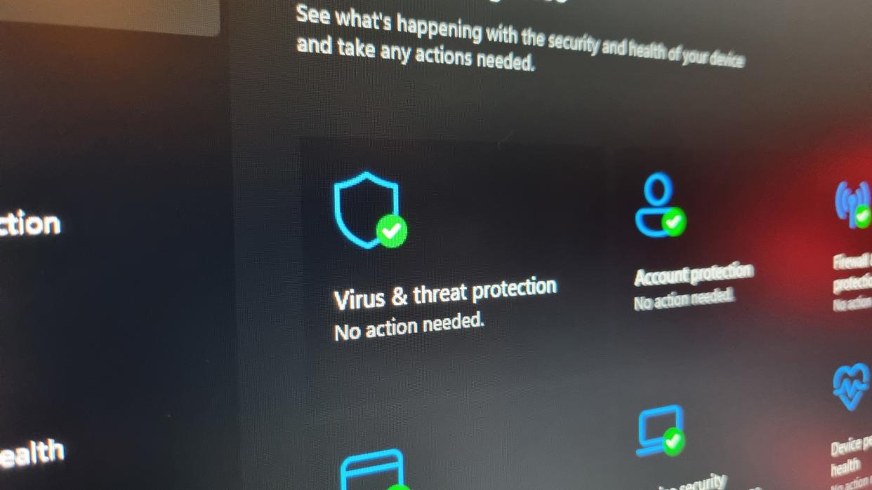  Windows virus and threat protection, with "no action needed" specified. 