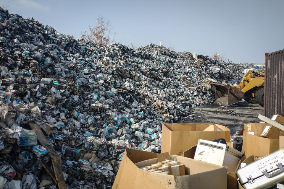 A leftover stack of Artnaturals hand sanitizers by the the company's warehouse, after a fire  erupted here on Sept. 30, 2021. (Amy Martyn)