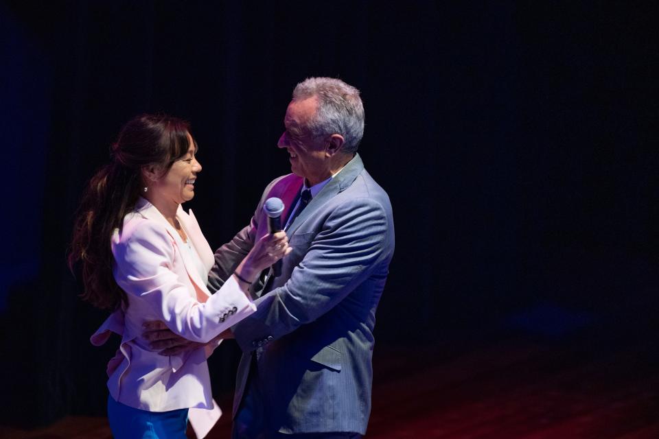 Presidential candidate Robert F. Kennedy Jr. and running mate Nicole Shanahan make a brief appearance at the end of the 3 1/2-hour campaign event "A Night of Country & Comedy" at Ryman Auditorium in Nashville, Tenn., Wednesday, May 15, 2024.