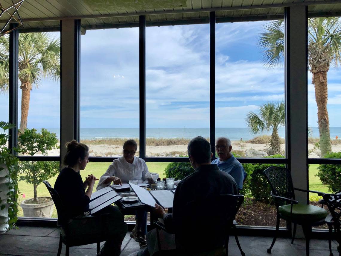 Diners enjoy a sunny coastal afternoon at Sea Captain’s House. The Myrtle Beach eatery was named the South Carolina restaurant with the best view. March 6, 2023.