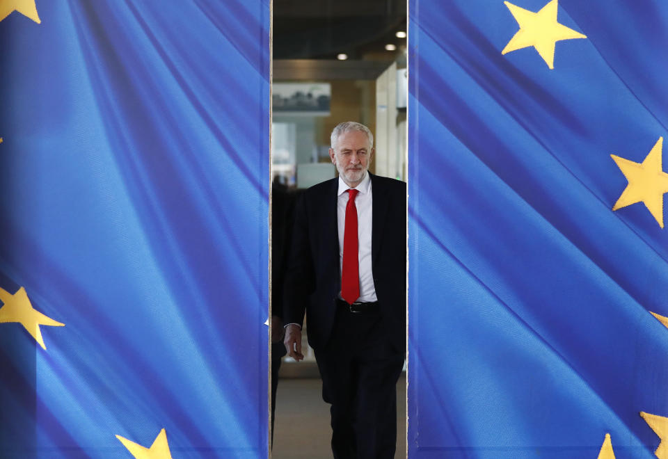 British Labour Party leader Jeremy Corbyn leaves EU headquarters prior to an EU summit in Brussels, Thursday, March 21, 2019. British Prime Minister Theresa May is trying to persuade European Union leaders to delay Brexit by up to three months, just eight days before Britain is scheduled to leave the bloc. (AP Photo/Frank Augstein)