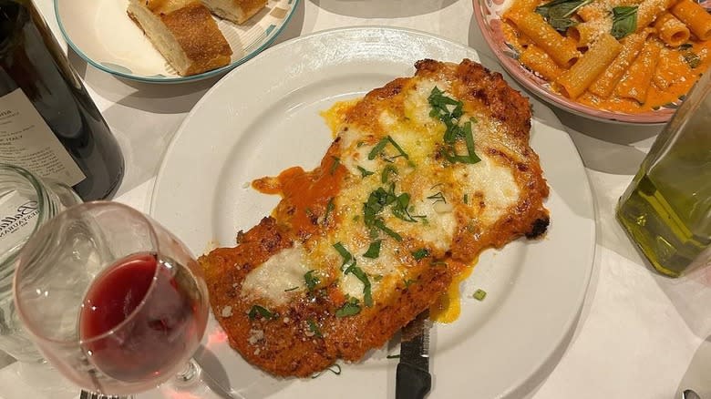 Chicken Parmesan and other dishes from Emilio's Ballato