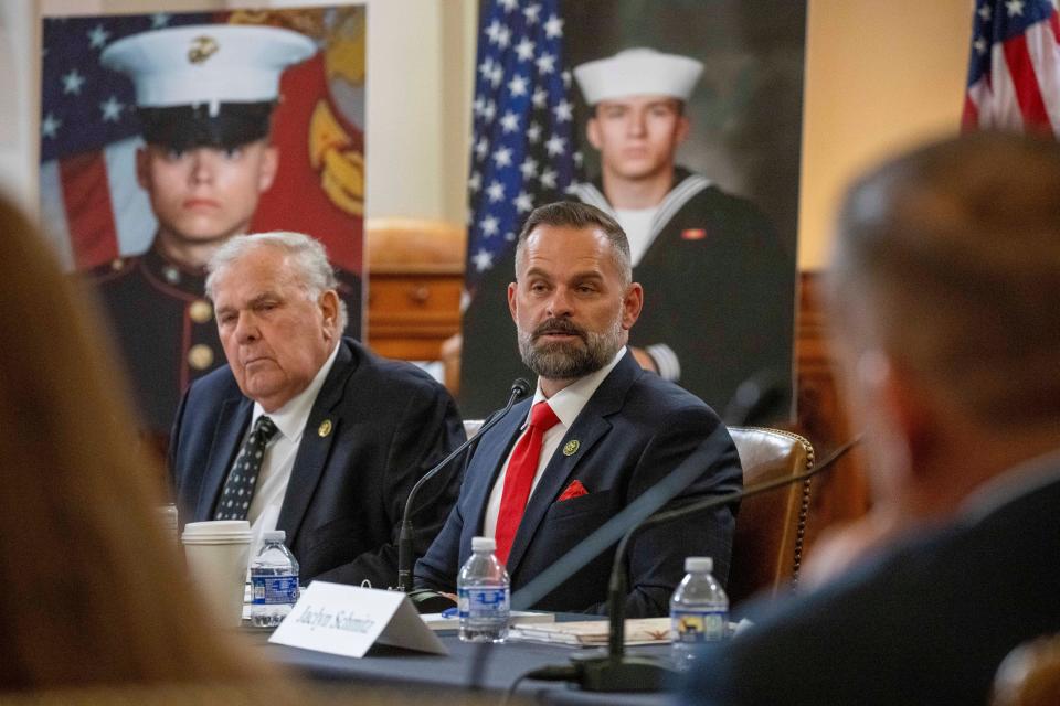 Rep. Cory Mills, R-Fla., right, speaks discussion about the terrorist attack at Hamid Karzai International Airport's Abbey Gate during a House Foreign Affairs Committee roundtable, on Capitol Hill, Tuesday, Aug. 29, 2023 in Washington. (AP Photo/Alex Brandon)
