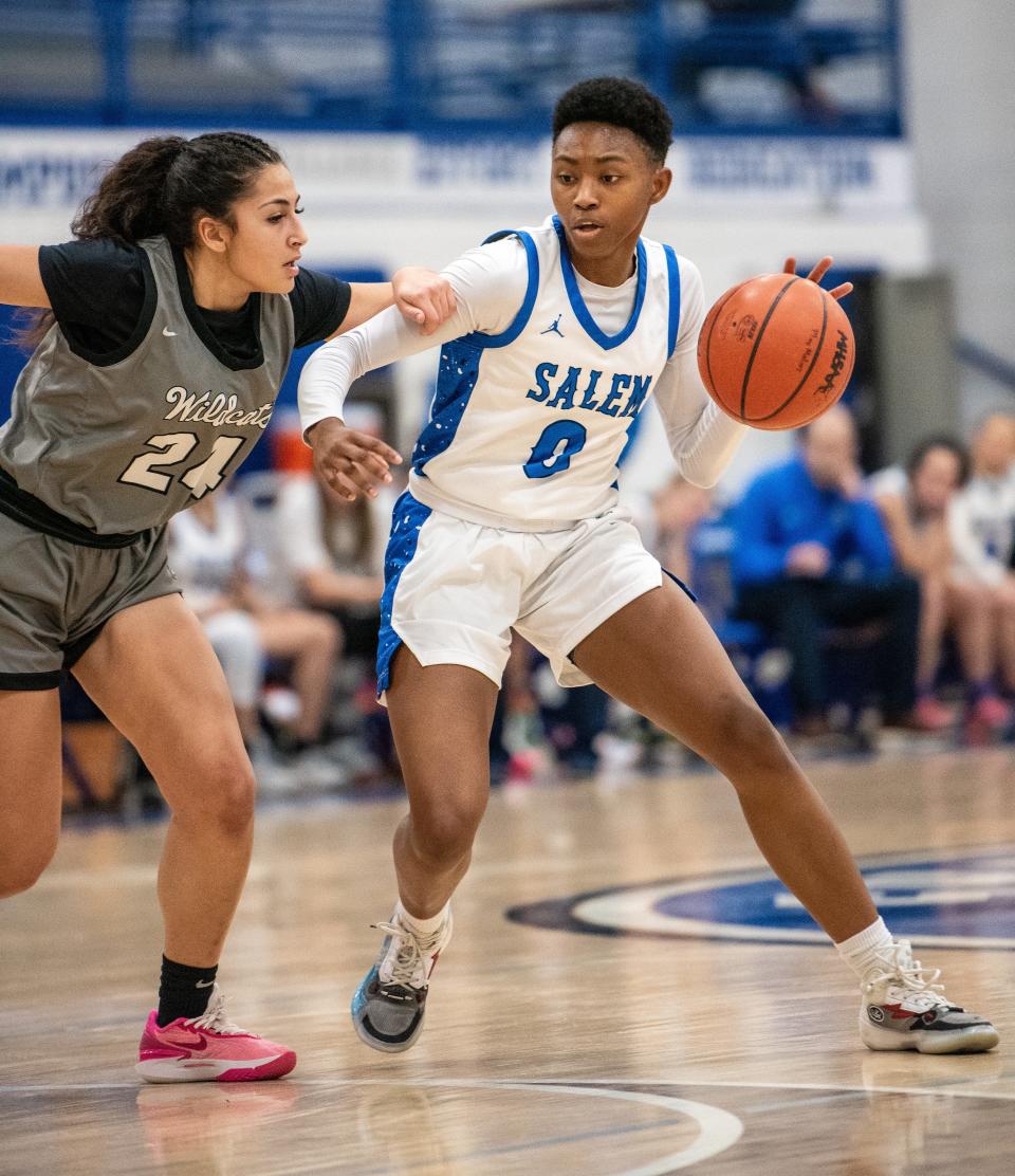 Plymouth's Zaynab Saab battles Salem's Madison Morson during a Kensington Lakes Activities Association-West girls basketball game on Thursday, Jan. 18, 2024.