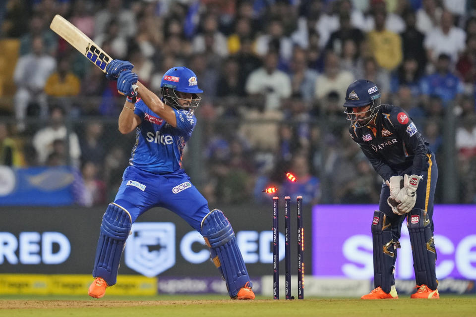 Mumbai Indians' Nehal Wadhera loses his wicket during the Indian Premier League cricket match between Mumbai Indians and Gujrat Titans in Mumbai, India, Friday, May 12, 2023. (AP Photo /Rajanish Kakade)