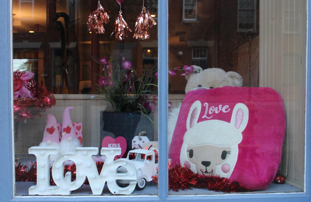 A Valentine's Day-themed window display at Enlightenment Family Services in Old Towne Petersburg on Feb. 9, 2023 designed by owner Lynda Lofton.