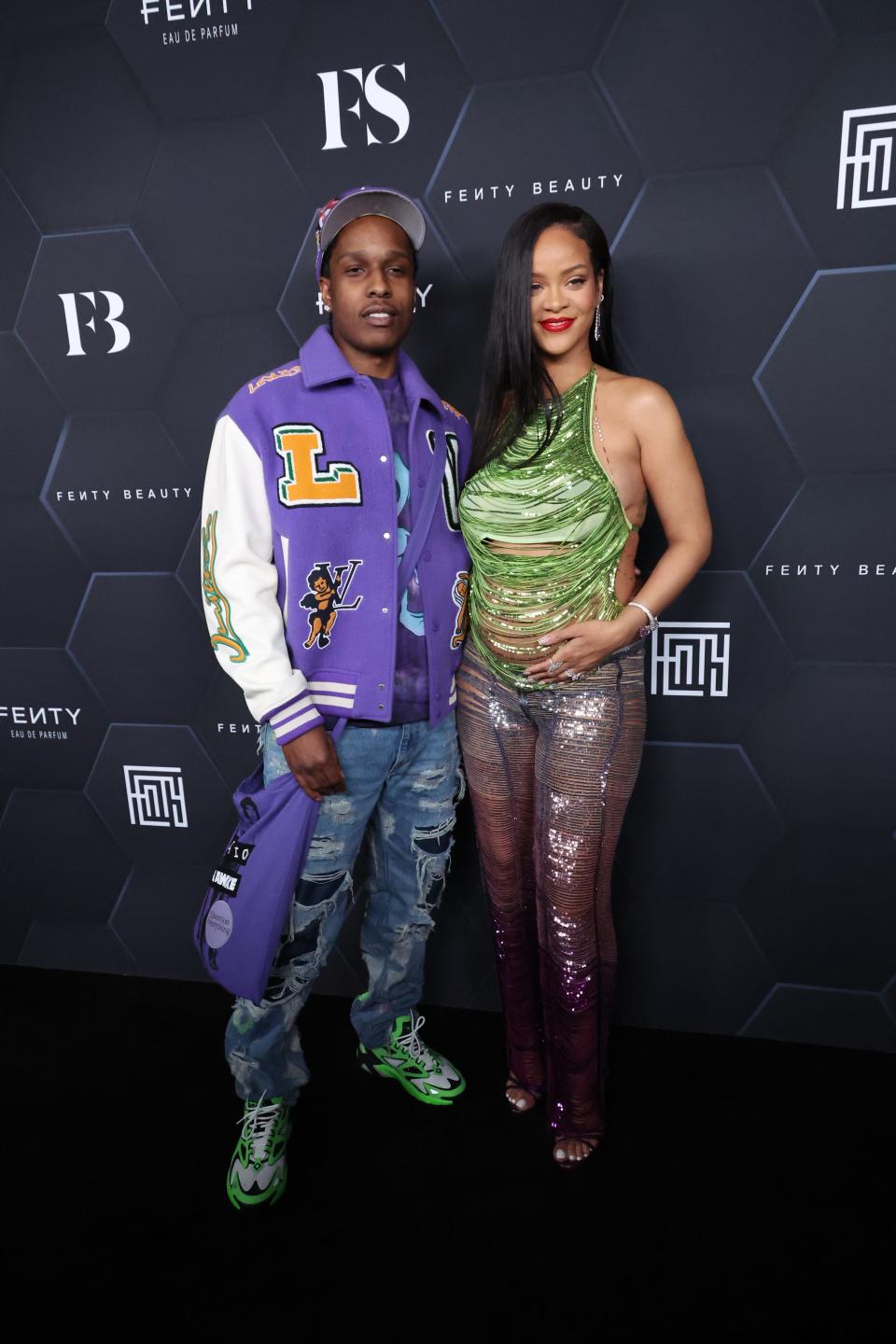 A$AP Rocky and Rihanna pose for a picture as they celebrate her beauty brands Fenty Beauty and Fenty Skinat Goya Studios on February 11, 2022 in Los Angeles, California.