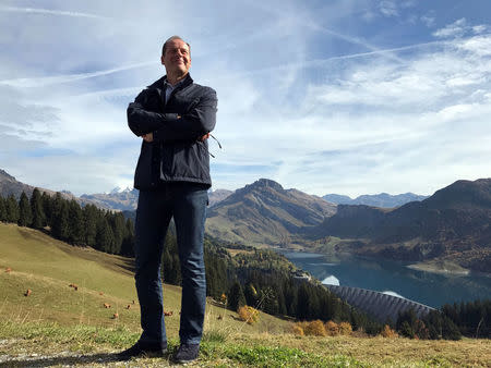 Tour de France director Christian Prudhomme poses in the Alps at the Col des Glieres which will feature on the first mountain stage in the Alps in the 2018 edition of the cycling event, near Le Petit-Bornand-les-Glieres, France, September 29, 2017. Picture taken September 29, 2017. REUTERS/Julien Pretot