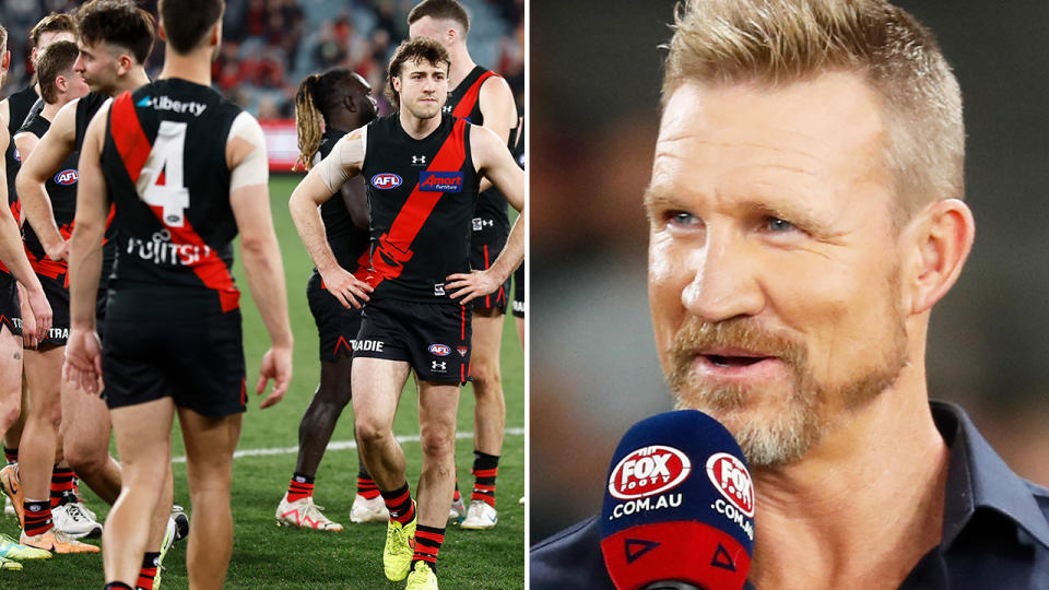Nathan Buckley, pictured here alongside Essendon players.