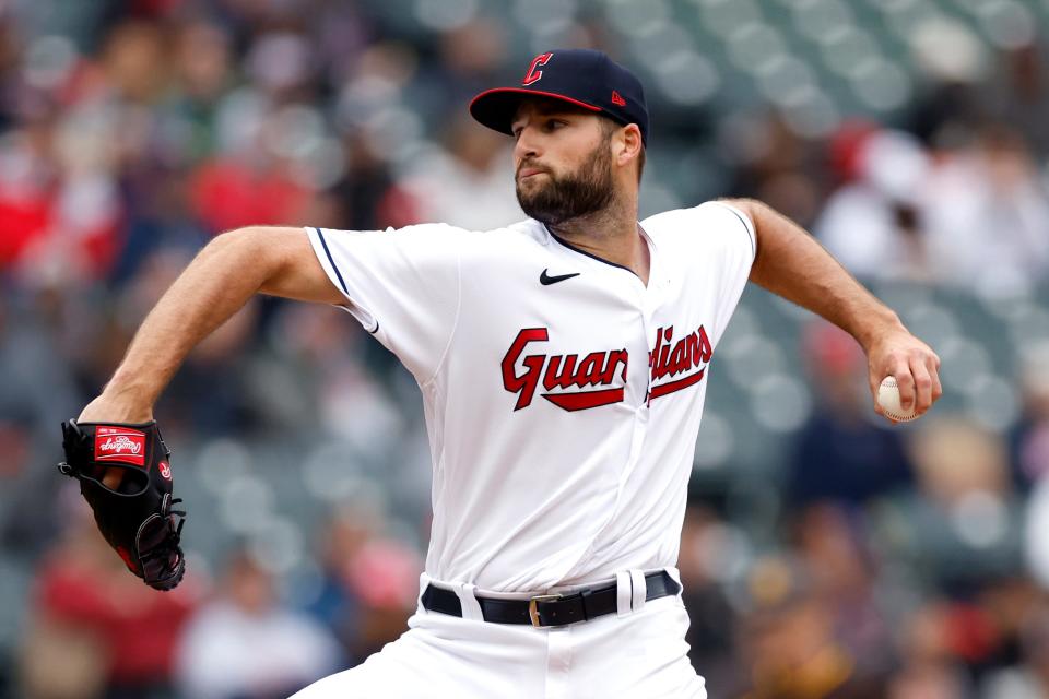 Cleveland Guardians relief pitcher Sam Hentges throws against the San Diego Padres during the seventh inning in the first baseball game of a doubleheader, Wednesday, May 4, 2022, in Cleveland. (AP Photo/Ron Schwane)