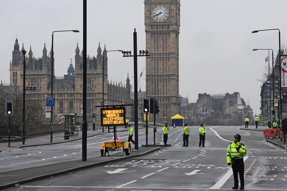 Police stand on a closed Westminster Bridge the morning after terror attack 2017