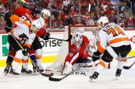 Apr 16, 2016; Washington, DC, USA; Washington Capitals goalie Braden Holtby (70) makes a save on Philadelphia Flyers center Chris VandeVelde (76) in the second period in game two of the first round of the 2016 Stanley Cup Playoffs at Verizon Center. Mandatory Credit: Geoff Burke-USA TODAY Sports
