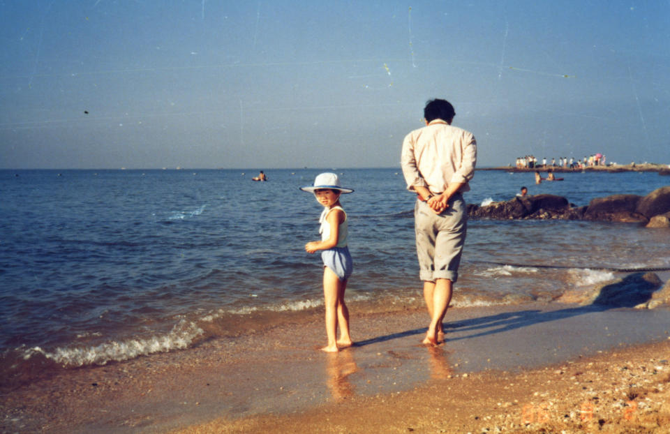 father and daughter on the beach