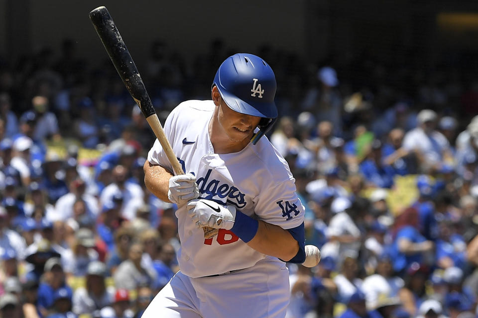 Los Angeles Dodgers' Will Smith is hit by a pitch during the first inning of a baseball game against the San Diego Padres Sunday, July 3, 2022, in Los Angeles. (AP Photo/Mark J. Terrill)