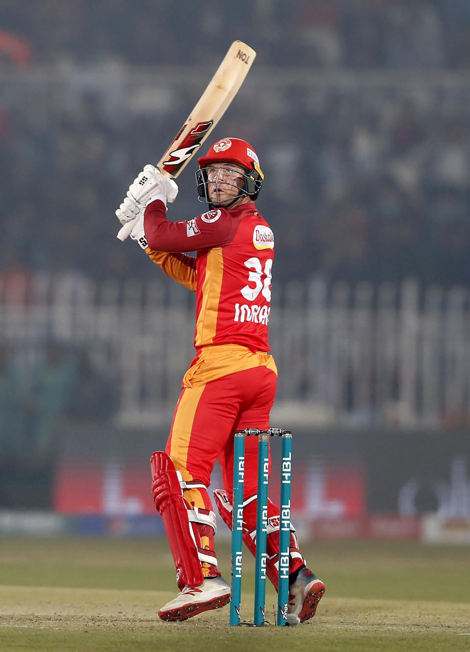 Islamabad United batsman Colin Ingram follows the ball after playing a shot during a Pakistan Super League T20 cricket match against Quetta Gladiators at Rawalpindi Stadium, in Rawalpindi, Pakistan, Thursday, Feb. 27, 2020. (AP Photo/Anjum Naveed)