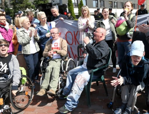 Around 100 Poles gathered in front of the parliament at the start of the protest in April