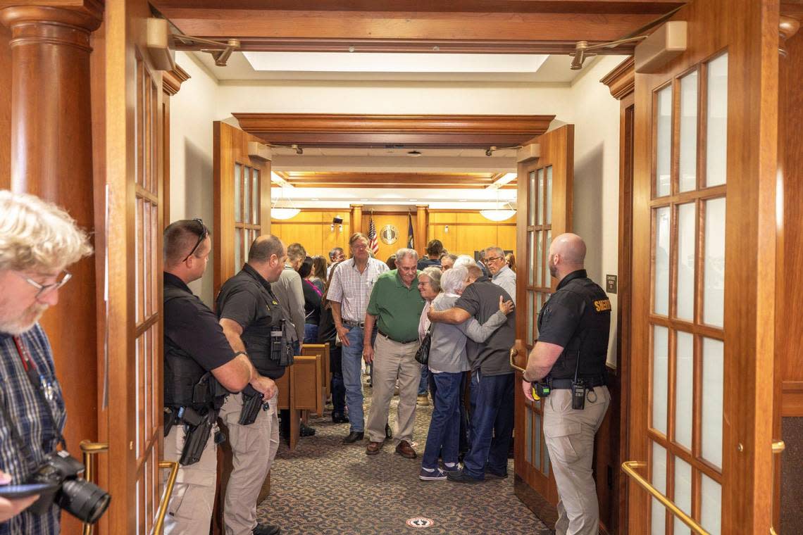 Family, friends and supporters of Crystal Rogers embrace following the arraignment for Brooks Houck at the Nelson County Courthouse in Bardstown, Ky., on Thursday, Oct. 5, 2023. Houck has been charged in the murder of Crystal Rogers.